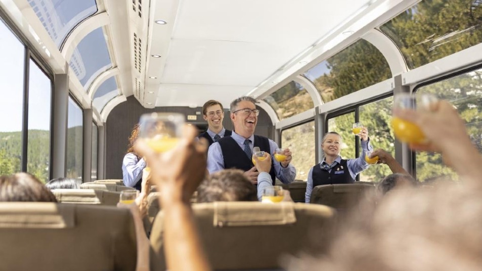 Guests celebrate onboard rocky mountaineer train