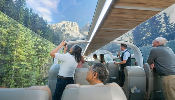 Guests taking photos of the scenery in the luxury Goldleaf dome