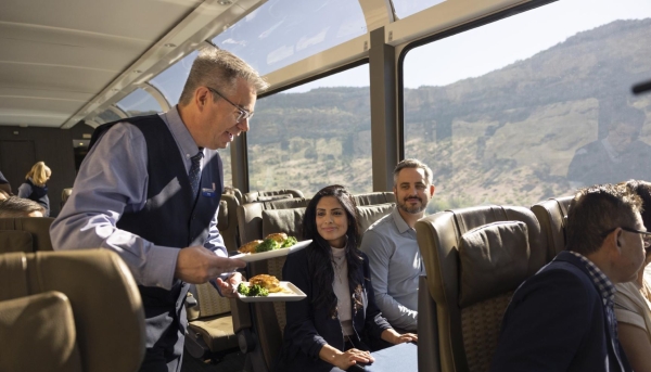 Locally-inspired cuisine being served onboard the Rocky Mountaineer luxury train