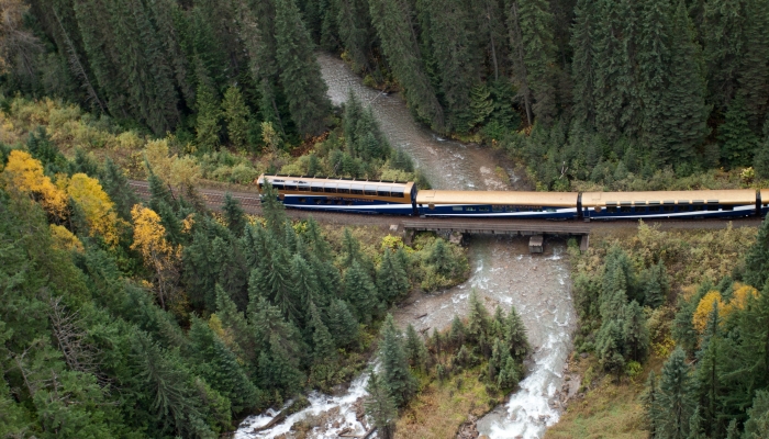 Rocky Mountaineer train passing over a river in British Columbia