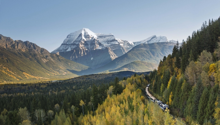 Rocky Mountaineer train with Mount Robson, British Columbia in the background