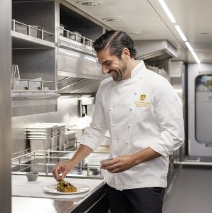 Rocky Mountaineer's Executive Chef Kaelhub Cudmore in the kitchen.