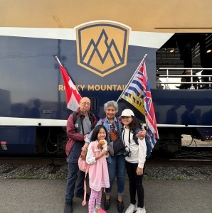 Family outside the GoldLeaf Coach