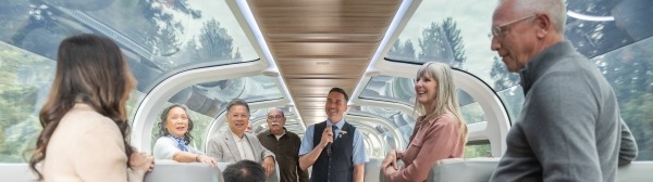 Host giving commentary to guests in GoldLeaf