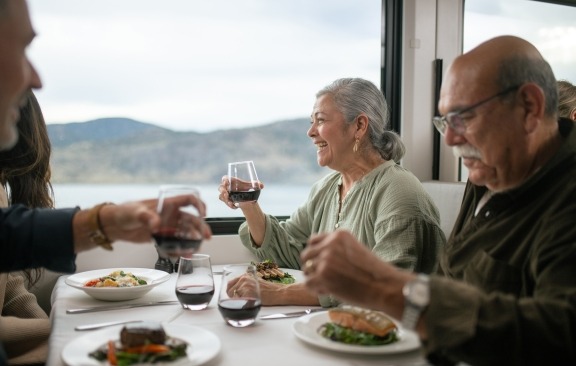 Couple enjoying a meal on Goldleaf service.