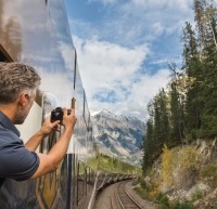 Guest takes photo from Outdoor Viewing Platform.