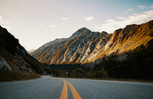 Winding road surrounded by mountain ranges near Salt Lake City.